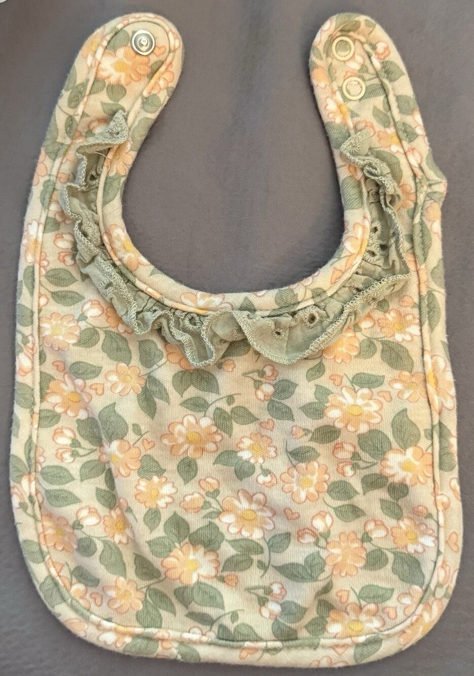 Nicole Miller New York Floral Ruffle Baby Bib Size 3-6m Snap Closure Green Peach